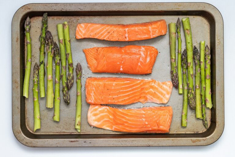 Salmon fillets and asparagus on a sheet pan